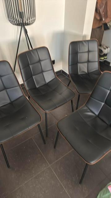 4 Eetkamer stoelen in vegan leder, zwart met bruine rand beschikbaar voor biedingen