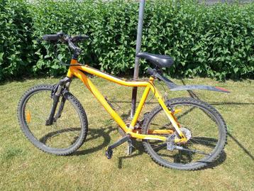Oranje MTB ideale laadpaalfiets beschikbaar voor biedingen