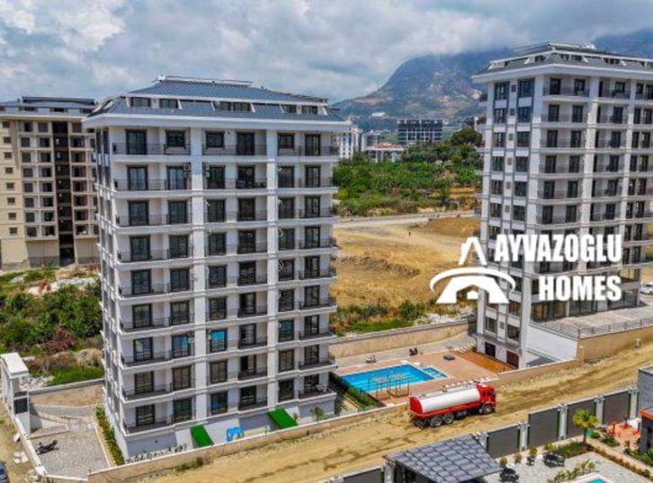 Ruim 2+1 appartement in Mahmutlar, Immo, Buitenland, Turkije, Appartement