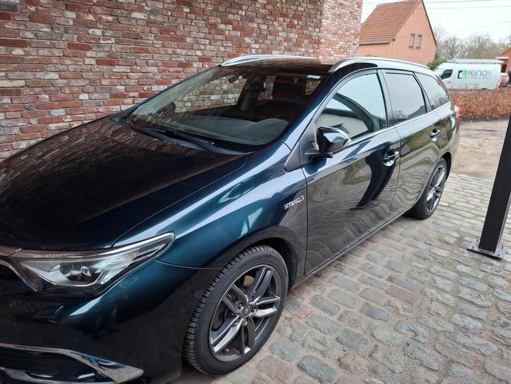 Toyota auris touring sport hybride, Auto's, Toyota, Particulier, Auris, Zetelverwarming, Benzine, 5 deurs, Automaat, Leder, Ophalen