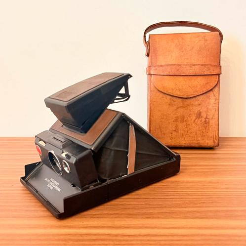 POLAROID SX70 ALPHA MET ORIGINELE HOES SX 79 LEER VINTAGE, Audio, Tv en Foto, Fotocamera's Analoog, Gebruikt, Polaroid, Polaroid