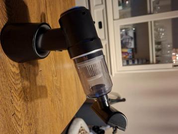 Draagbare handstofzuiger beschikbaar voor biedingen