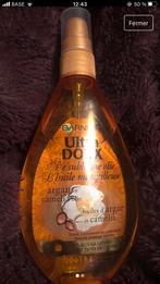 L'huile merveilleuse huiles d'argan et camélias Garnier, Handtassen en Accessoires, Uiterlijk | Haarverzorging, Zo goed als nieuw