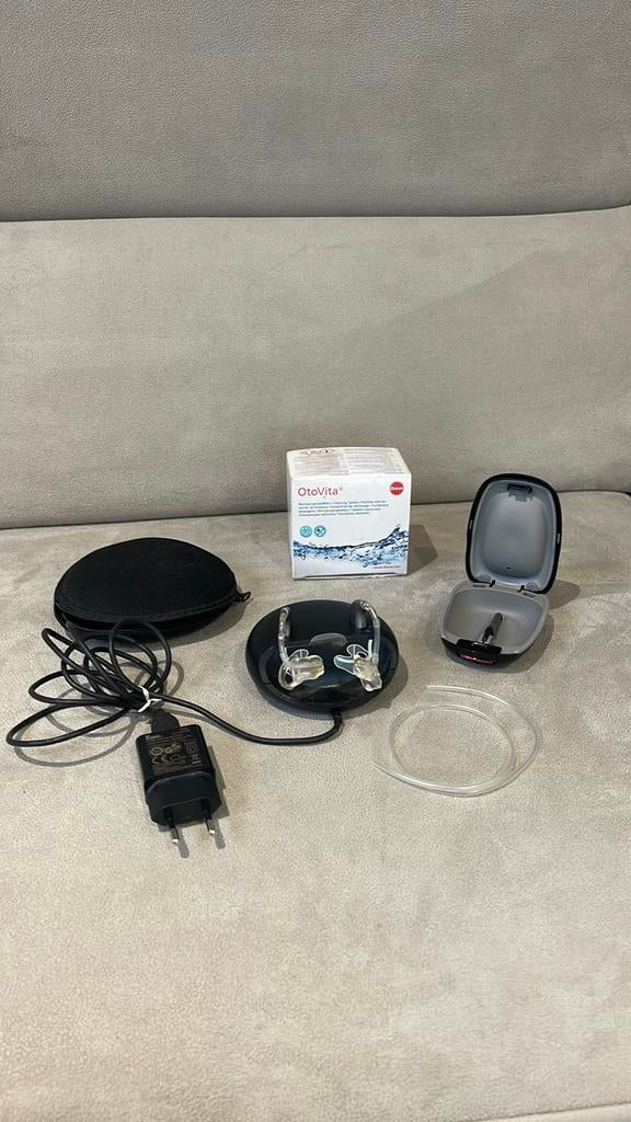 Bernafon hoortoestellen op oplaadstation, Ophalen, Gebruikt