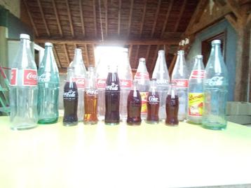 Vintage Coca Cola: volle vintage flessen