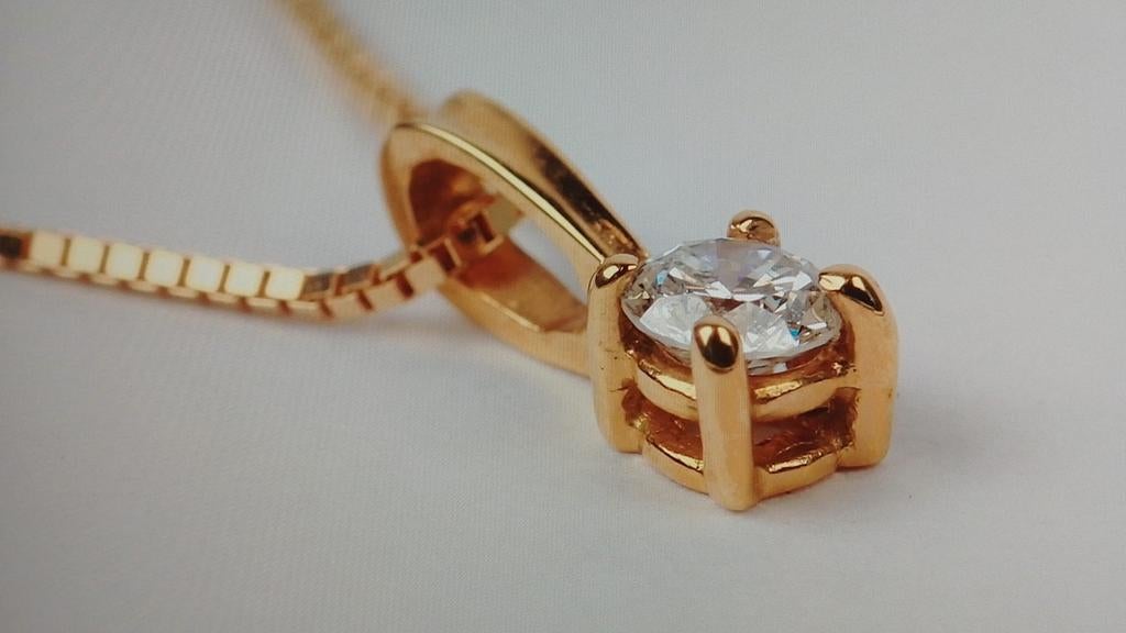 18 karaat gouden ketting met diamant 0,15ct met certificaat., Handtassen en Accessoires, Kettingen, Zo goed als nieuw, Goud, Goud