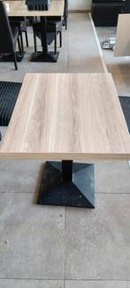 Tweepersoons tafel met gietijzeren voet, Ophalen