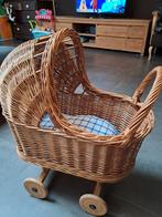 Poppenwagen in gevlochten riet, Ophalen