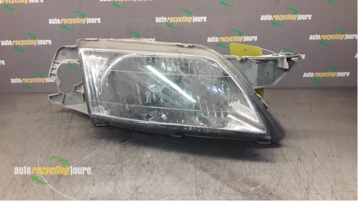 Koplamp rechts van een Mazda Premacy, Auto-onderdelen, Verlichting, Mazda, Gebruikt, 3 maanden garantie