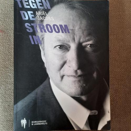 TEGEN DE STROOM IN - ARIËL JACOBS, Boeken, Biografieën, Sport, Ophalen of Verzenden