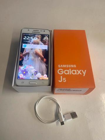 M 🟧’SAMSUNG J5’ Incl. Oplader-/Doos🟧(Goede staat) disponible aux enchères