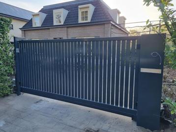 Lamellen houtlook schuifpoort of draaipoort incl montage beschikbaar voor biedingen