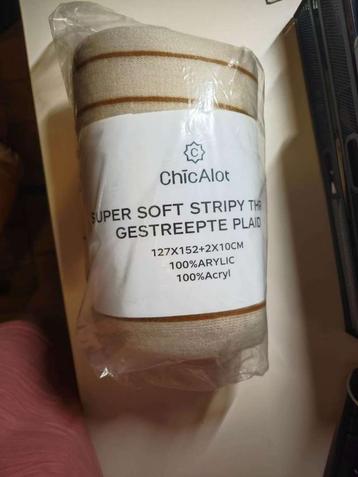 Superzachte deken met strepen beschikbaar voor biedingen
