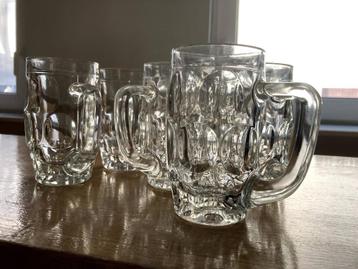 7 glazen bierpullen beschikbaar voor biedingen