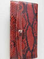 Enveloppetas slangenleder pierre cardin, Ophalen