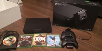 xbox one x - 1TB - 2 rechargeable controllers - 4 games beschikbaar voor biedingen