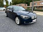 Bmw 116i urban line, Auto's, Euro 5, 4 cilinders, Blauw, Leder en Stof
