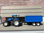 Bruder New Holland TG285 en kiepwagen, Kinderen en Baby's, Ophalen of Verzenden, Gebruikt