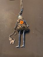Très beau long collier avec personnage, Zo goed als nieuw