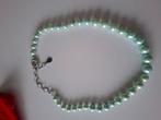 Mooie watergroene  parelketting merk Titto, Enlèvement