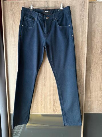 Stretch denim broek maat 34 beschikbaar voor biedingen