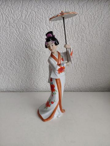 Beeld dame met paraplu beschikbaar voor biedingen