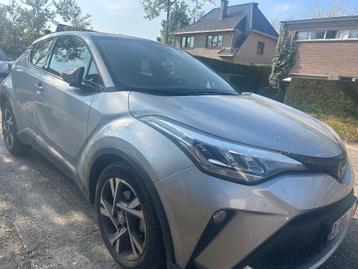 Toyota CHR hybride jaar 2023 km 40000 als nieuw, Auto's, Toyota, Automaat, USB, 72 kW, Leder en Stof