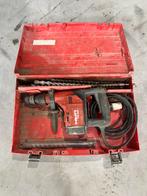 Hilti klopboormachine, Ophalen