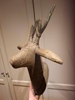 Stenen hertenhoofd Pomax, Ophalen