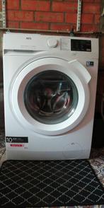 AEG wasmachine L6FBI86W, Elektronische apparatuur, 6 tot 8 kg, Zo goed als nieuw, Ophalen, Voorlader