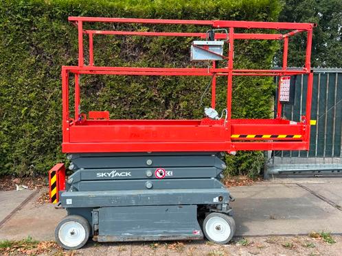 Skyjack SJ III3219 schaarhoogwerker 8m skyjack hoogwerker, Zakelijke goederen, Machines en Bouw | Liften, Steigers en Ladders