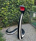 Serpent en platre, Ophalen