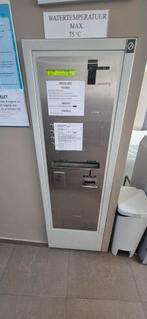 Antenor jeton automaat voor wassalon, Ophalen