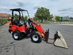 Kniklader Manitou met amper 580 uren, Ophalen