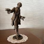 bronzen beeldje, Ophalen