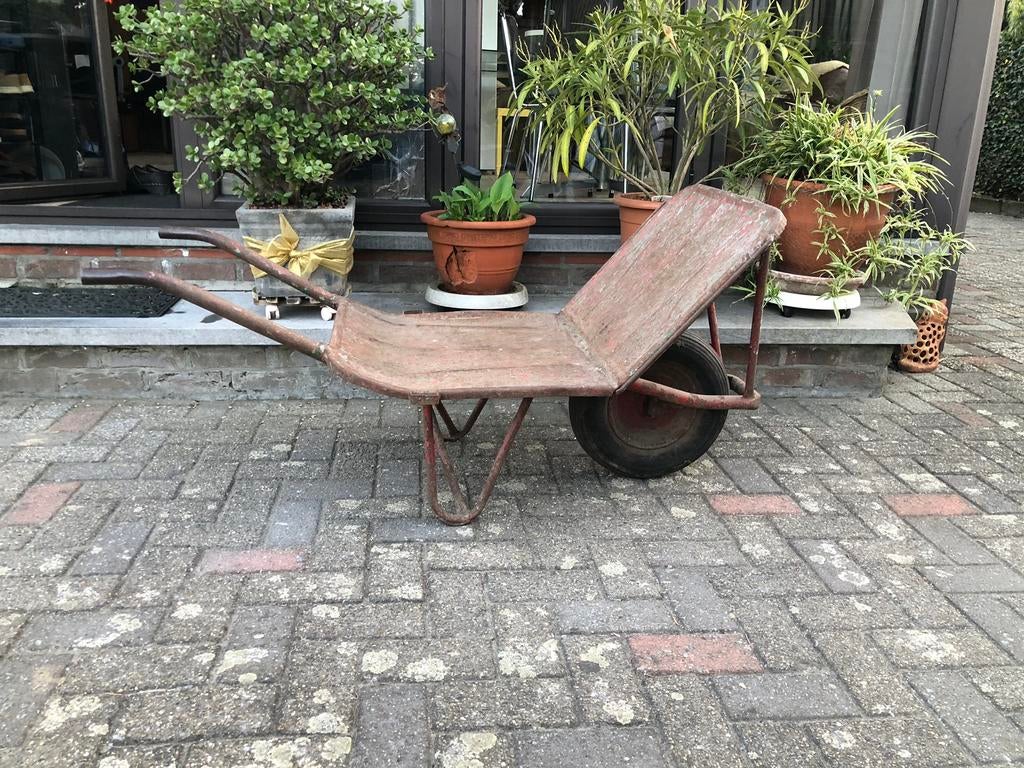 Platte kruiwagen, Ophalen