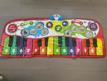Pianotapijt met vele mogelijkheden van Mundo Diver beschikbaar voor biedingen