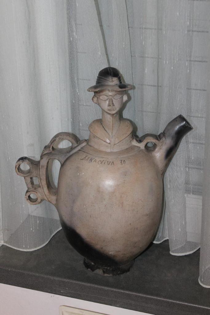 Afrikaanse pot met koloniaal hoofd (jaren 50), Antiek en Kunst, Kunst | Beelden en Houtsnijwerken, Ophalen