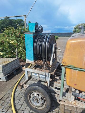 Spuitmachine met haspel beschikbaar voor biedingen