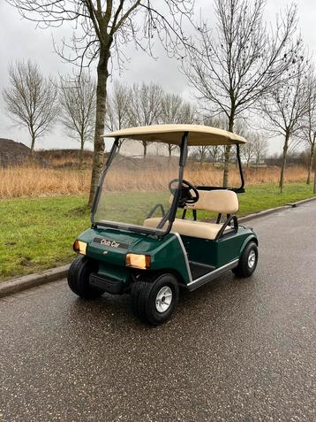 Electrische golfkar clubcar in nieuwstaat met verlichting  beschikbaar voor biedingen