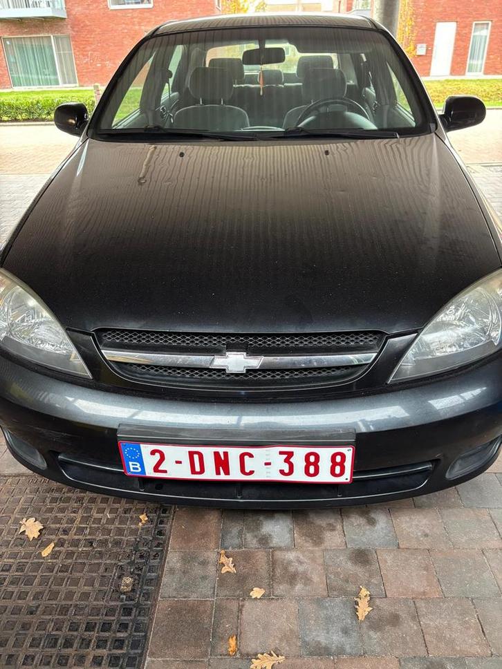 Chevrolet Lacetti 1,4, Auto's, Chevrolet, Particulier, Lacetti, Benzine, 5 deurs, Handgeschakeld, Zwart, Onderhoudsboekje, Ophalen