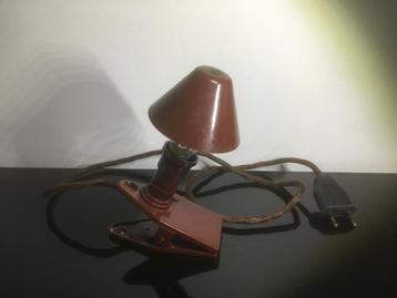 Oud bakelieten knijplampje beschikbaar voor biedingen