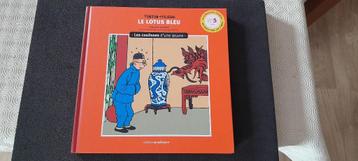 BOEK KUIFJE DE BLAUWE LOTUS ACHTER DE SCHERMEN VAN EEN WERK beschikbaar voor biedingen