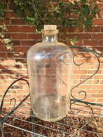 Grote glazen apothekersfles met kurk, Ophalen