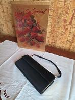 Vintage handtasje met speciaal compartement, Ophalen