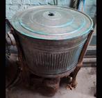 Antieke wasmachine, Ophalen