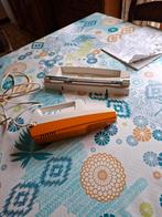 Couteau electrique Moulinex vintage avec applique murale.