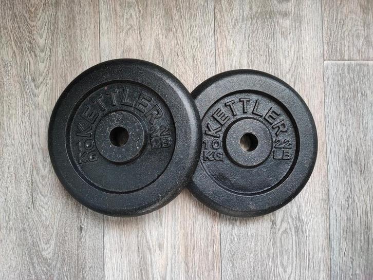 2 x 10kg Kettler halterschijven. (20kg) (Goede staat!), Sport en Fitness, Fitnessmaterialen, Gebruikt, Halterschijven, Armen, Benen