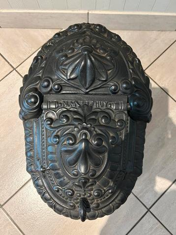 Gietijzer kolenkist antiek beschikbaar voor biedingen