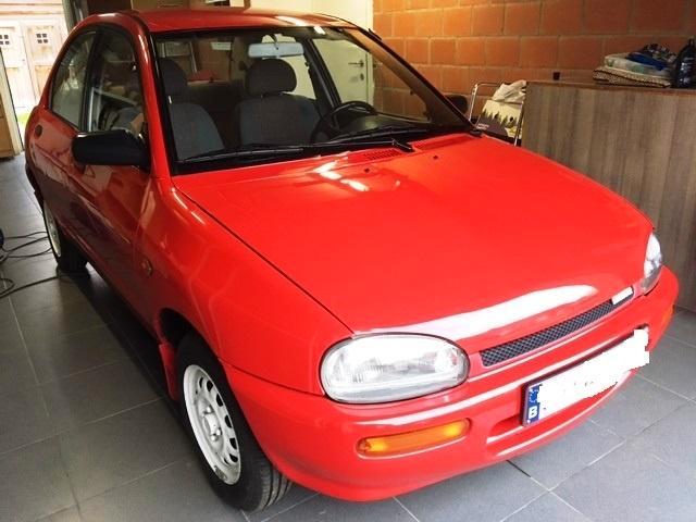 MAZDA 121 Oldtimer bwj 1992, Auto's, Oldtimers, Particulier, Mazda, Benzine, Stadsauto, 5 deurs, Handgeschakeld, Rood, Zwart, Stof